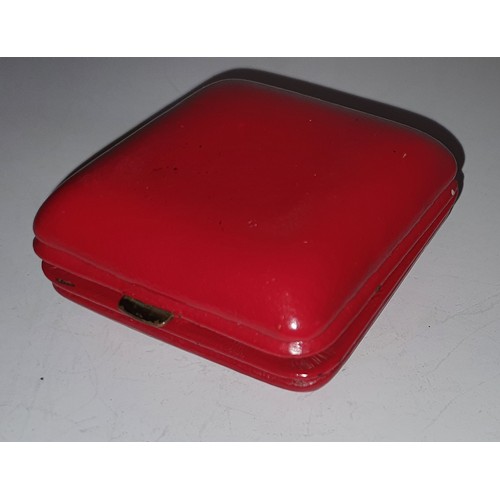 27 - Vintage Swiza travel alarm clock in red case