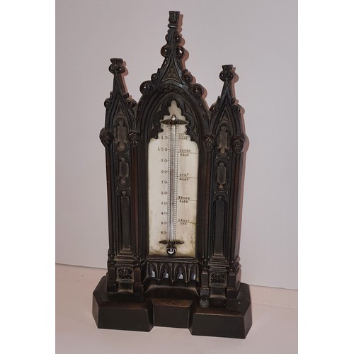 29 - A Bronze desk thermometer