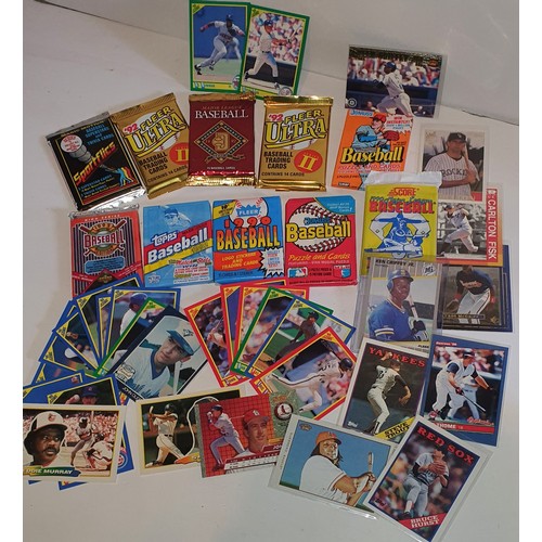 11 - A good selection of vintage unopened packs of baseball trading cards plus some loose cards