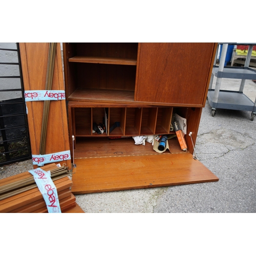 1b - Large Quantity of Mid Century Staples Ladderax Shelving: 7 Uprights, 31 Shelves, 2 Sliding Door Cupb... 