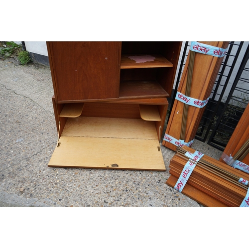 1b - Large Quantity of Mid Century Staples Ladderax Shelving: 7 Uprights, 31 Shelves, 2 Sliding Door Cupb... 