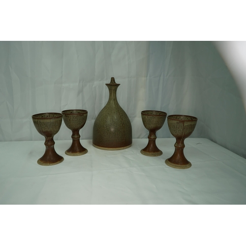 689 - Mid Century Studio Pottery Carafe and a Set of Wine Cups