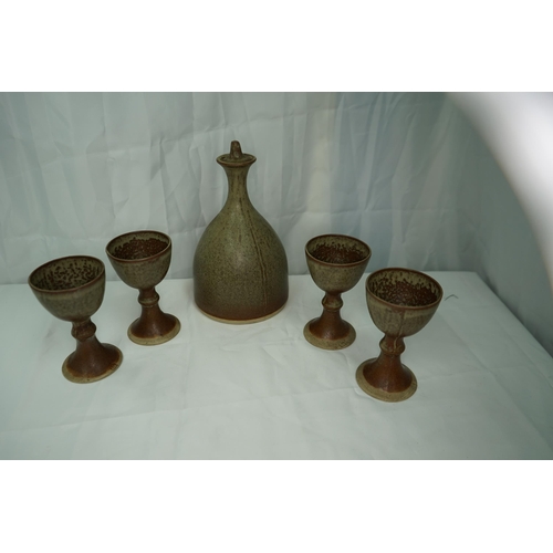 689 - Mid Century Studio Pottery Carafe and a Set of Wine Cups