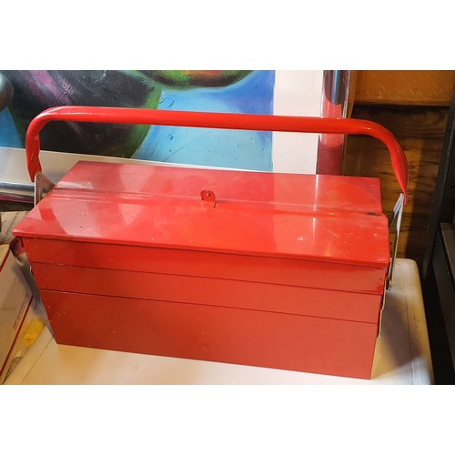 39 - Red metal toolbox containing various tools