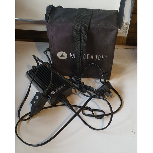 47 - A motocaddy battery and charger
