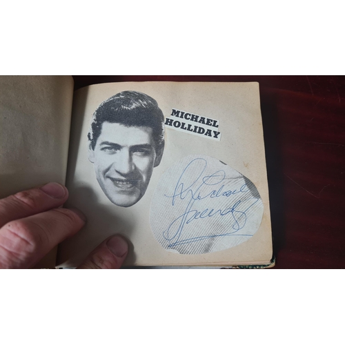 715 - 1960s Autograph Book-Highlights include: Tommy Cooper, Various Cricketers, Harry Corbett, Marty Wild... 