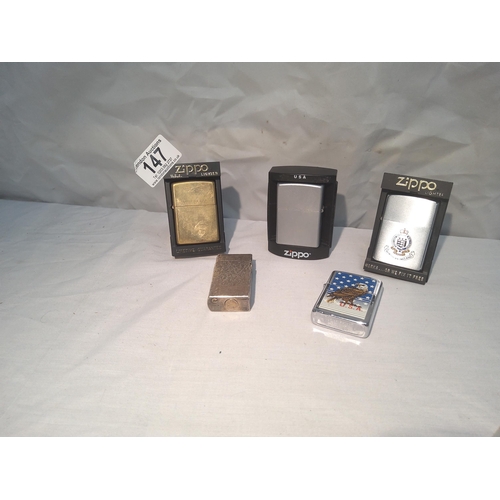 147 - A good lot of various zippo lighters