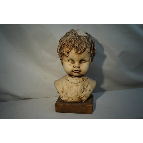 725 - Old Signed Bust of a Child on a Base