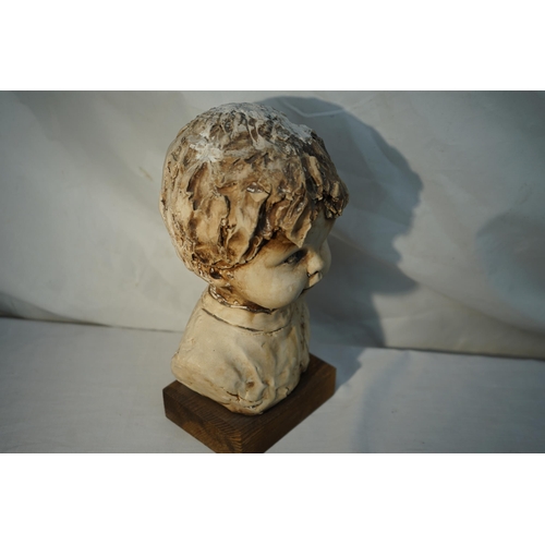 725 - Old Signed Bust of a Child on a Base