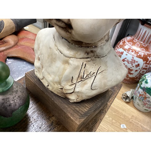 725 - Old Signed Bust of a Child on a Base