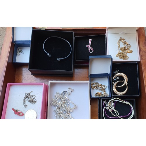 28 - Old wooden box containing a good selection of mixed Jewellery - Unsorted house clearance lot