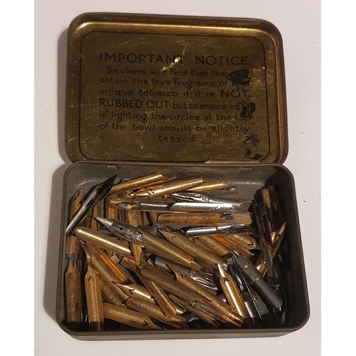 43 - Old tobacco tin containing a large quantity of vintage ink pen nibs etc