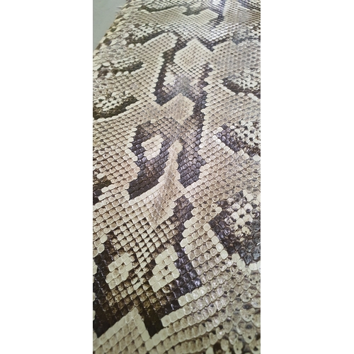 59 - Various long old snake skins