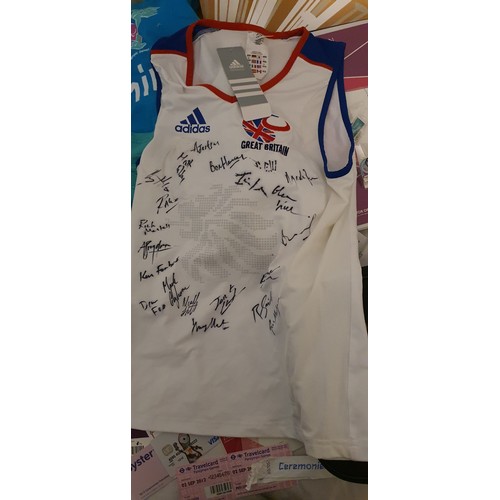 99 - A selection of London 2012 memorabilia including a signed top, Paperwork, tickets etc.