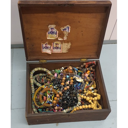 109 - Old wooden box containing a selection of costume jewellery