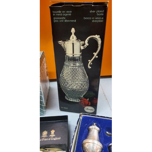 138 - A boxed vintage silver plate crystal claret jug, Pair of Arthur Price Napkin Rings plus other boxed ... 