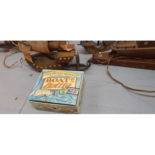 139 - Selection of model boats Inc boat lamp etc