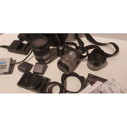 17 - Case containing 2x Sony Digital Cameras included additional lenses, Flashes and accessories