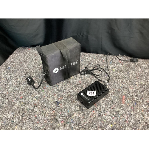 284 - A motocaddy battery and charger