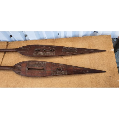 97 - A Pair of old wooden African Paddles