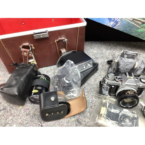 565 - Vintage Canon AE1 Camera with Accessories incl. Lenses, Tripod etc