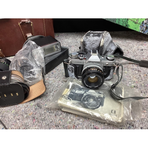 565 - Vintage Canon AE1 Camera with Accessories incl. Lenses, Tripod etc