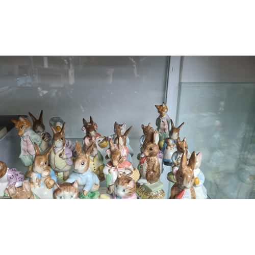 117 - Lot of 24 Beswick Beatrix Potter Figurines