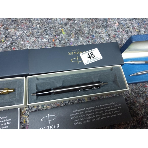 48 - 2 Boxed Parker Pens and a Cross Pen Set