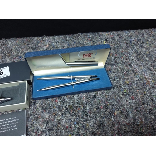 48 - 2 Boxed Parker Pens and a Cross Pen Set