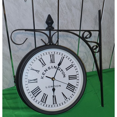 43 - Double sided wall clock with bracket