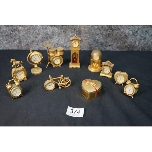 Collection of Miniature Brass Clocks