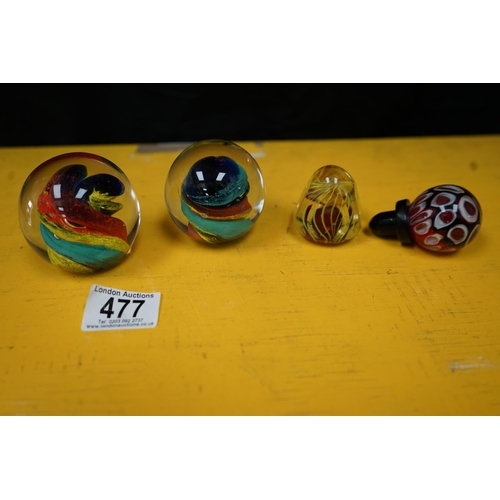 477 - 3 Glass Paperweights and a Bottle Stopper