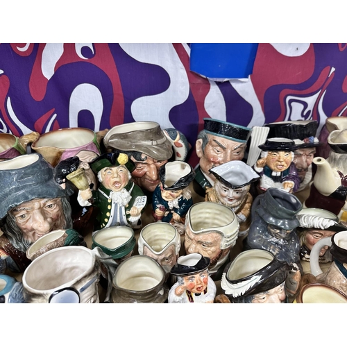 331 - Shelf Containing a Huge Collection of Royal Doulton Character, Toby Jugs etc