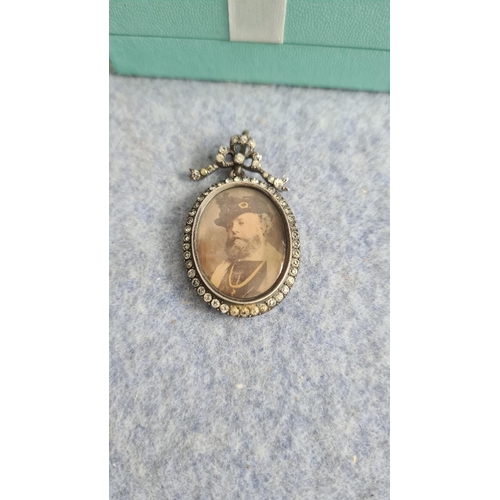 22 - White Metal Mourning Pendant-Portrait to the Front and Curl of Hair to the rear