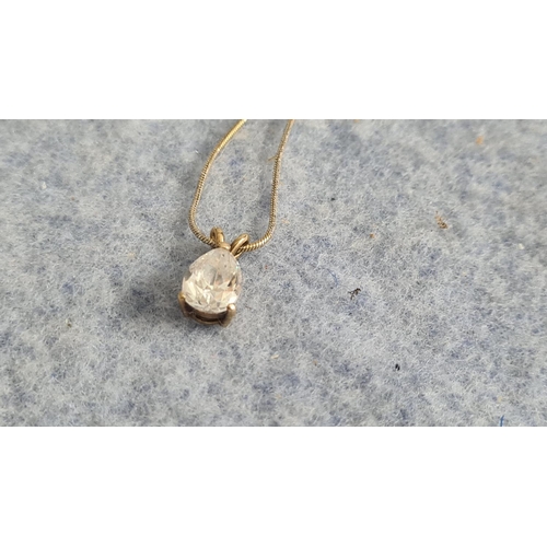 32 - Tests as 14k Gold CZ Ring (7.1g) Size N Plus an 18 ct Gold Chain (3.8g) and a 9ct Gold Metal Pendant... 