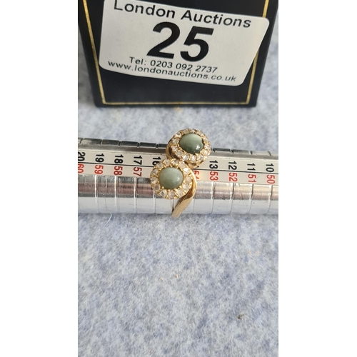 25 - 18ct Gold Ring with 2 Cabochan Aquamarines (each approx 0.8ct) and surrounding Diamonds 5.9g