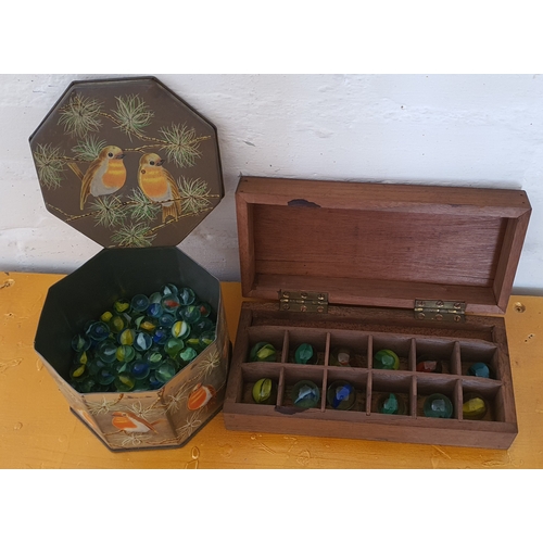 28 - Old tin and wooden box containing marbles