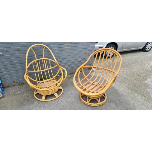 1001 - Pair of Mid Century Bamboo Swivel Egg Chairs