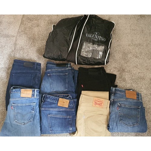 98 - Good lot of mens Jeans and a Valentino suit including Hugo Boss, Levis etc.