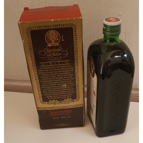 112 - Boxed vintage unopened bottle of Jägermeister