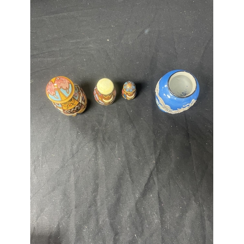 693 - Japanese Vase and a Set of Graduated Dolls