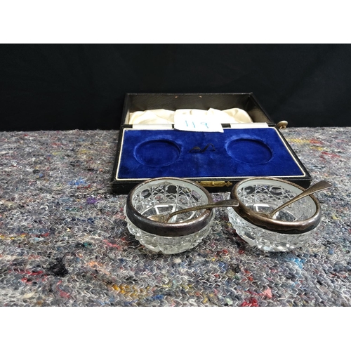 119 - Pair of Hallmarked Silver Rimmed Salts with plated Spoons