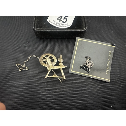 45 - Hallmarked Silver Spinning Wheel Brooch and a Silver Spinning Wheel Charm