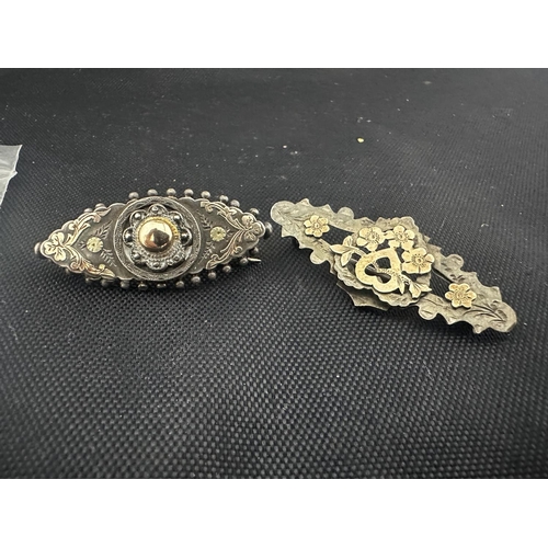 58 - Two Silver Brooches with Gold Overlay