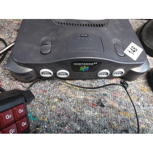 148 - Nintendo 64 Games Console with Controllers  Leads  a Sega Megadrive Arcade Power Stick & Various N64... 