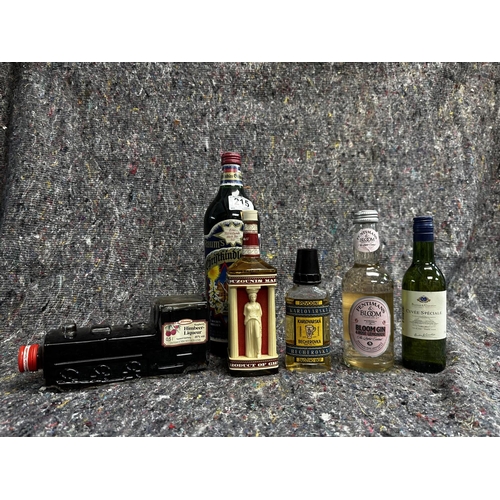 664 - A collection of interesting Liqueurs including an Ouzo Decanter Ouzounis Maidens Decanter 8in tall 1... 