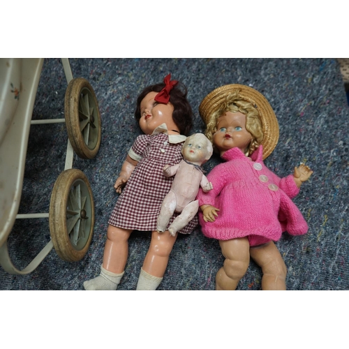 651 - Metal Dolls Pram with 3 Antique Bisque Socket Head Dolls