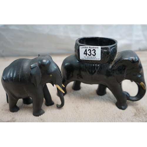 433 - Ceramic Elephant Planter and a Group of Carved Wooden Elephants