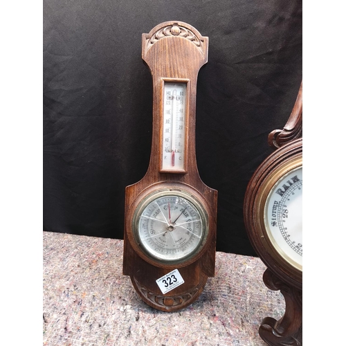 323 - Two Carved Oak Barometers (one has broken glass front)