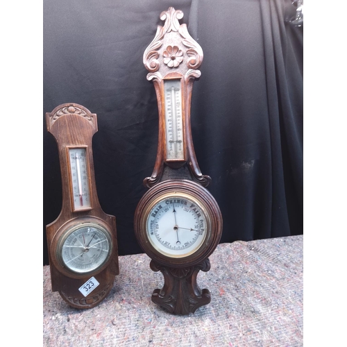 323 - Two Carved Oak Barometers (one has broken glass front)